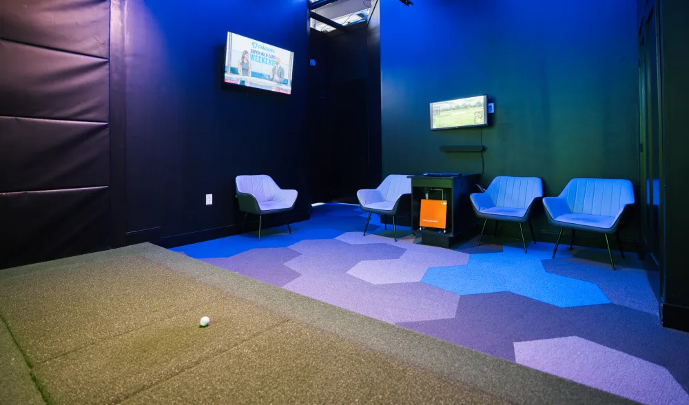 Seating inside a Swing Zone simulator suite